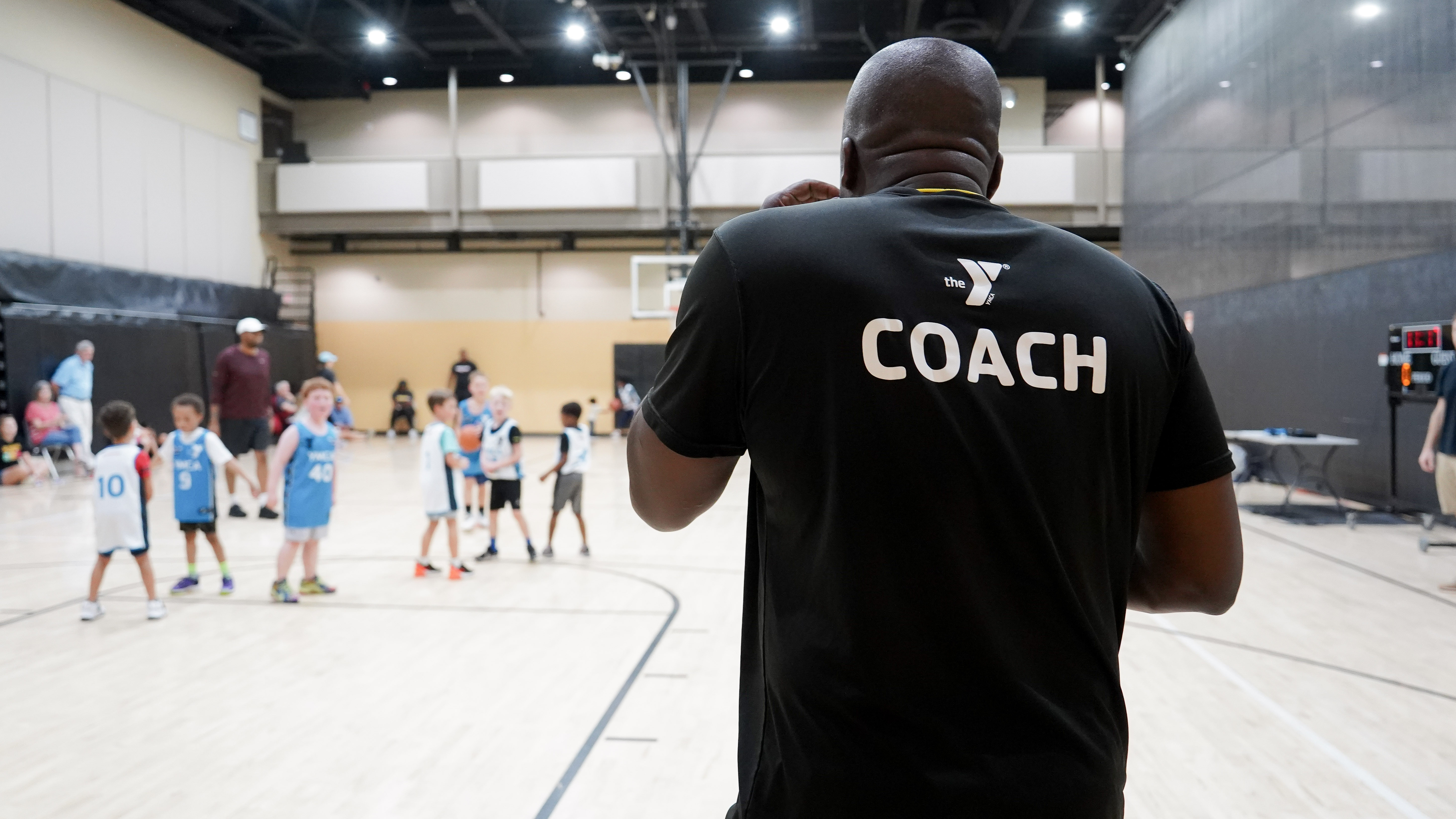 Youth playing indoor basketball at the Morrison YMCA