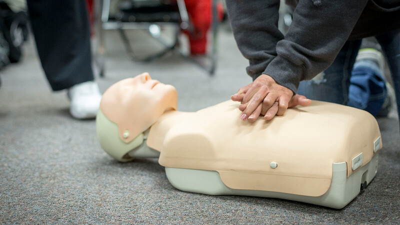 Explaining about first aid in life support class at the YMCA of Greater Charlotte